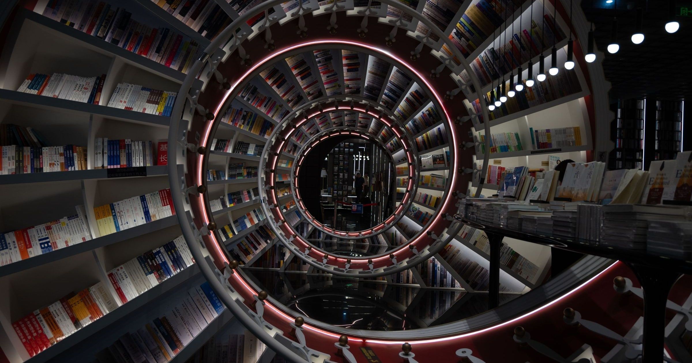 Spiral bookstore interior at Zhongshuge in Shenzhen, China, with curved shelves of books